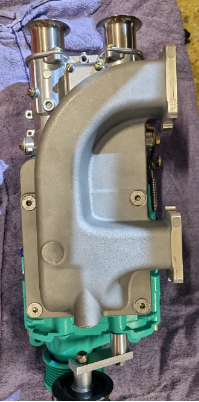 Final cast supercharger manifold fitted to the supercharger and carburettor assembly