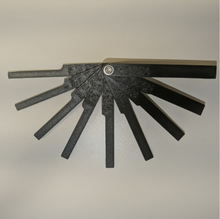 Windscreen gap setters spread into a fan to show the different gap sizes